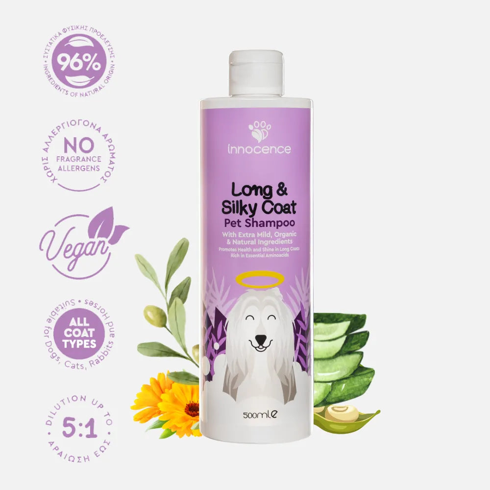 Dog Shampoo Organic, for Long and Silky coats, with characteristics badges around the bottle. Brand: Innocence